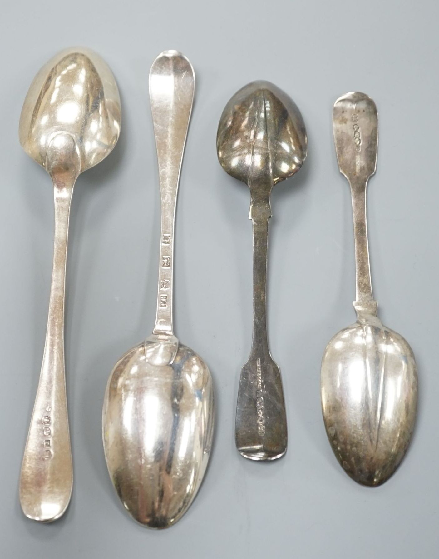 A pair of Victorian Irish silver fiddle pattern dessert spoons, Dublin, 1854, 18.1cm and two 18th century Scottish silver Old English pattern tablespoons, Edinburgh, 1765 & 1791, 7oz.